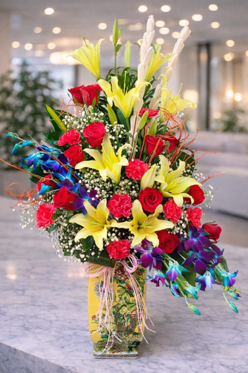 Luxury Mixed Floral Arrangement - Yellow Lilies, Red Roses & Exotic Blue Orchids