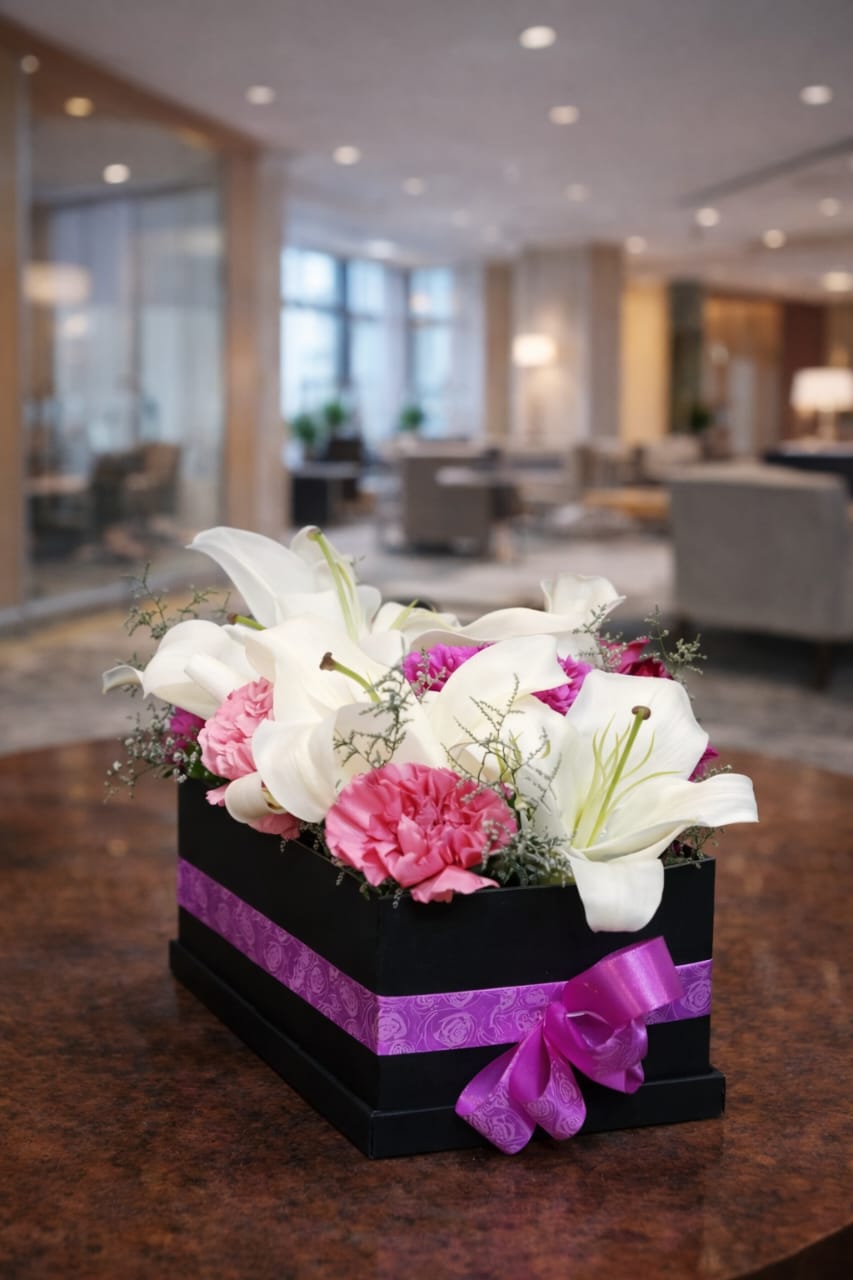 White Lily And Dark pink ,Light pink Carnation Box Arrangment