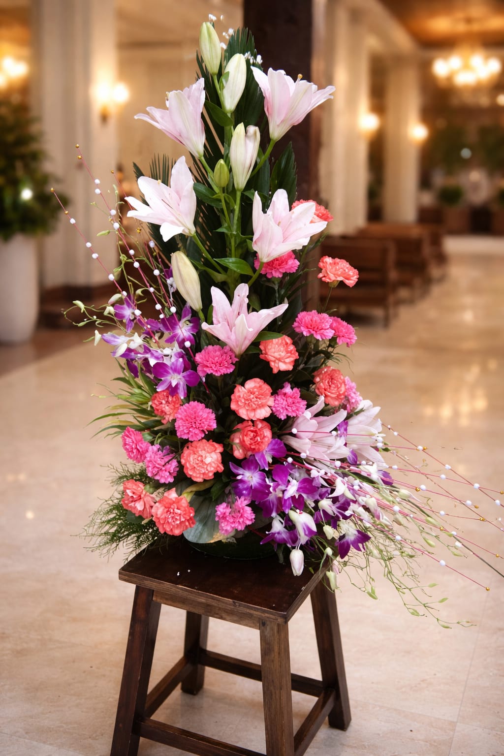 A vibrant mix of soft blush pink, deep magenta, vibrant purple, and warm peach/coral